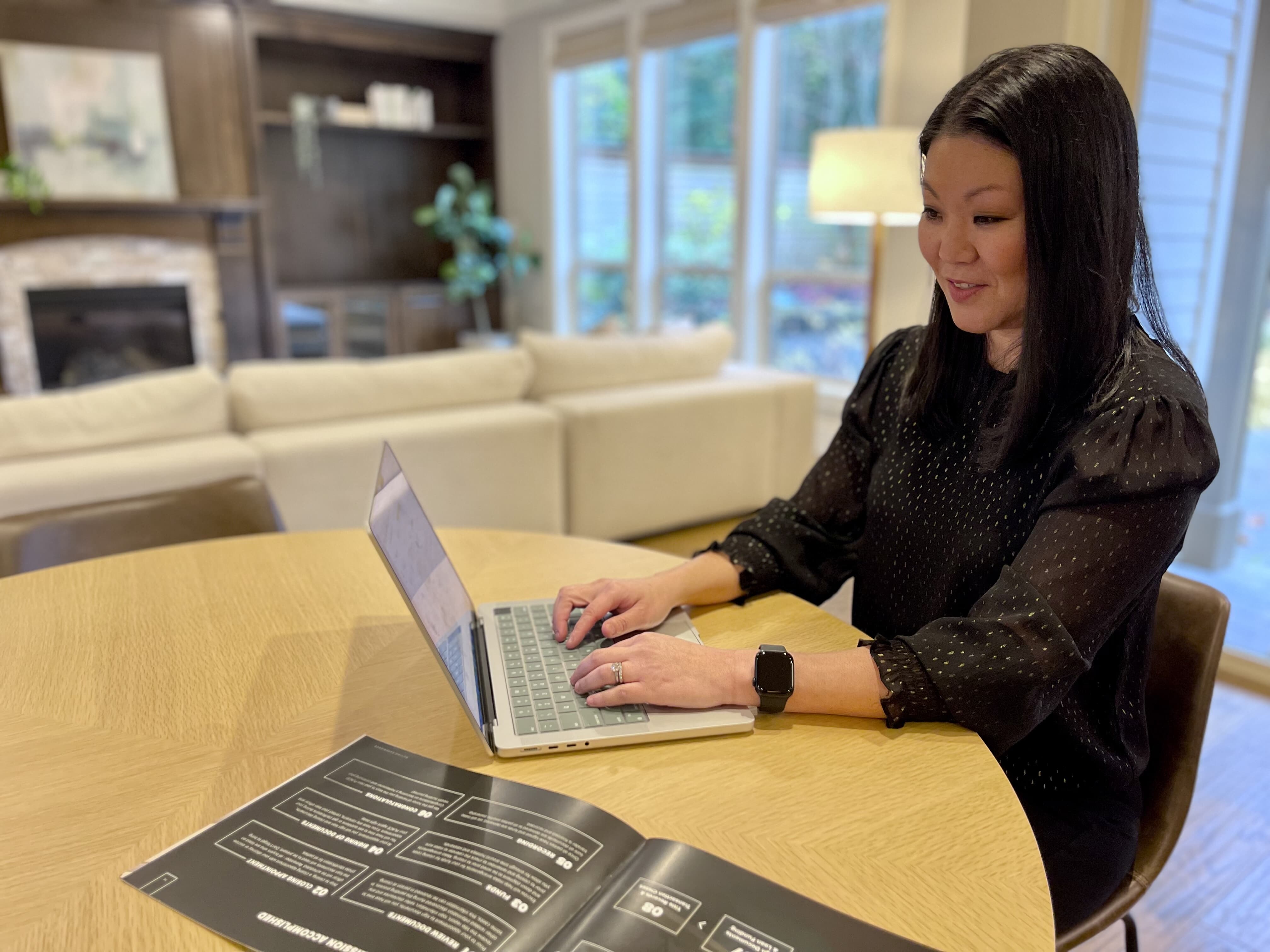 1. Cydelle reviewing documents with client 2. Cydelle Higa-Johnston _ Realtor, Windermere Realty Trust.jpg