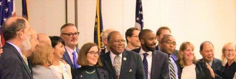 Gov. Kate Brown  and Sam Brooks.jpg