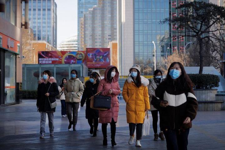 コロナ対策でマスクを付けた北京市民 コロナ対策でマスクを付けた北京市民