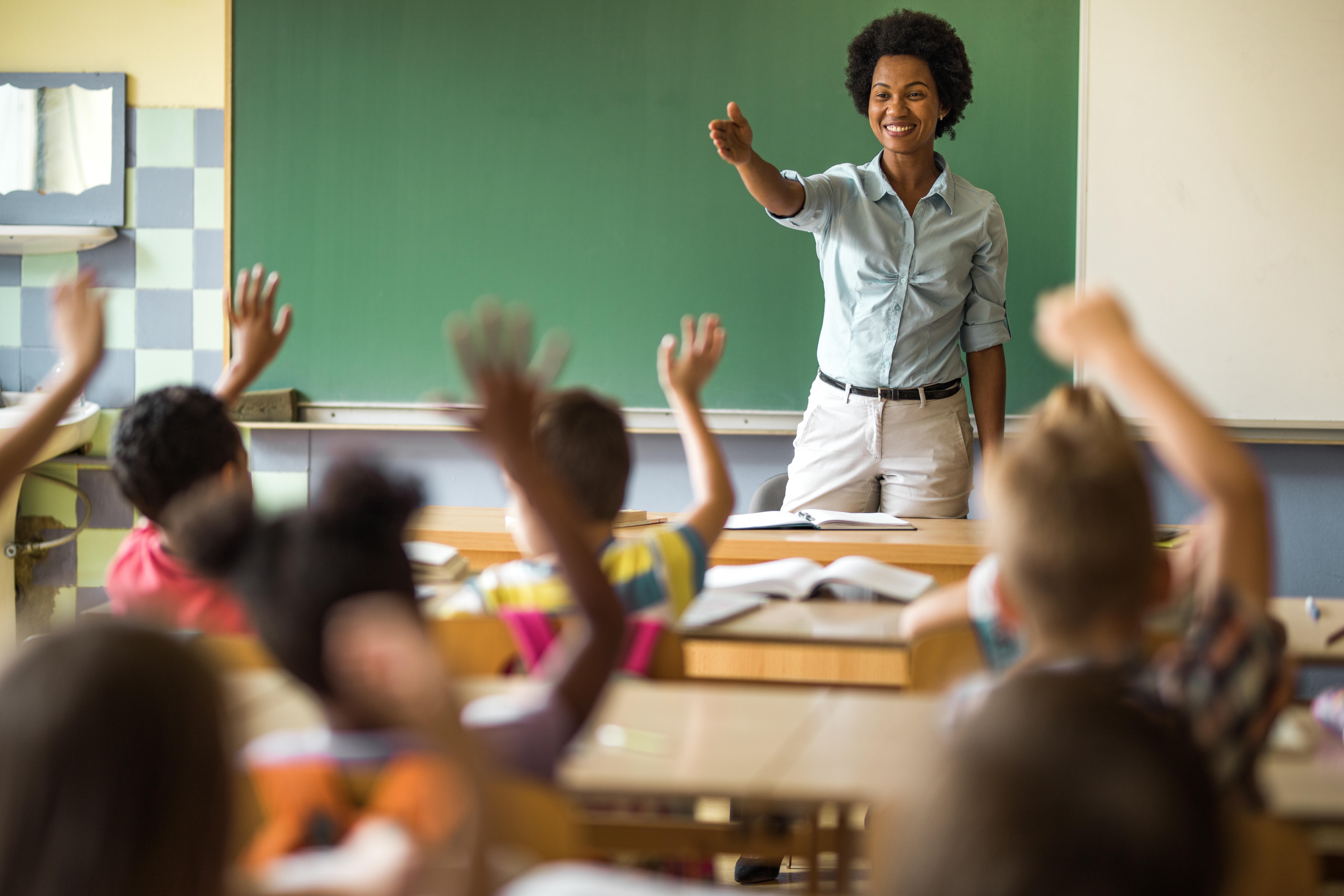 The teacher wants the students. Уважение к ученикам. С уважением студент. Счастливый учитель. Учитель картинка.